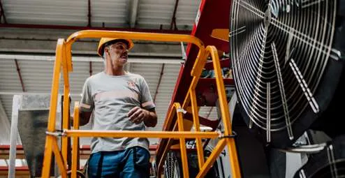 Engineer working on a large industrial cooler